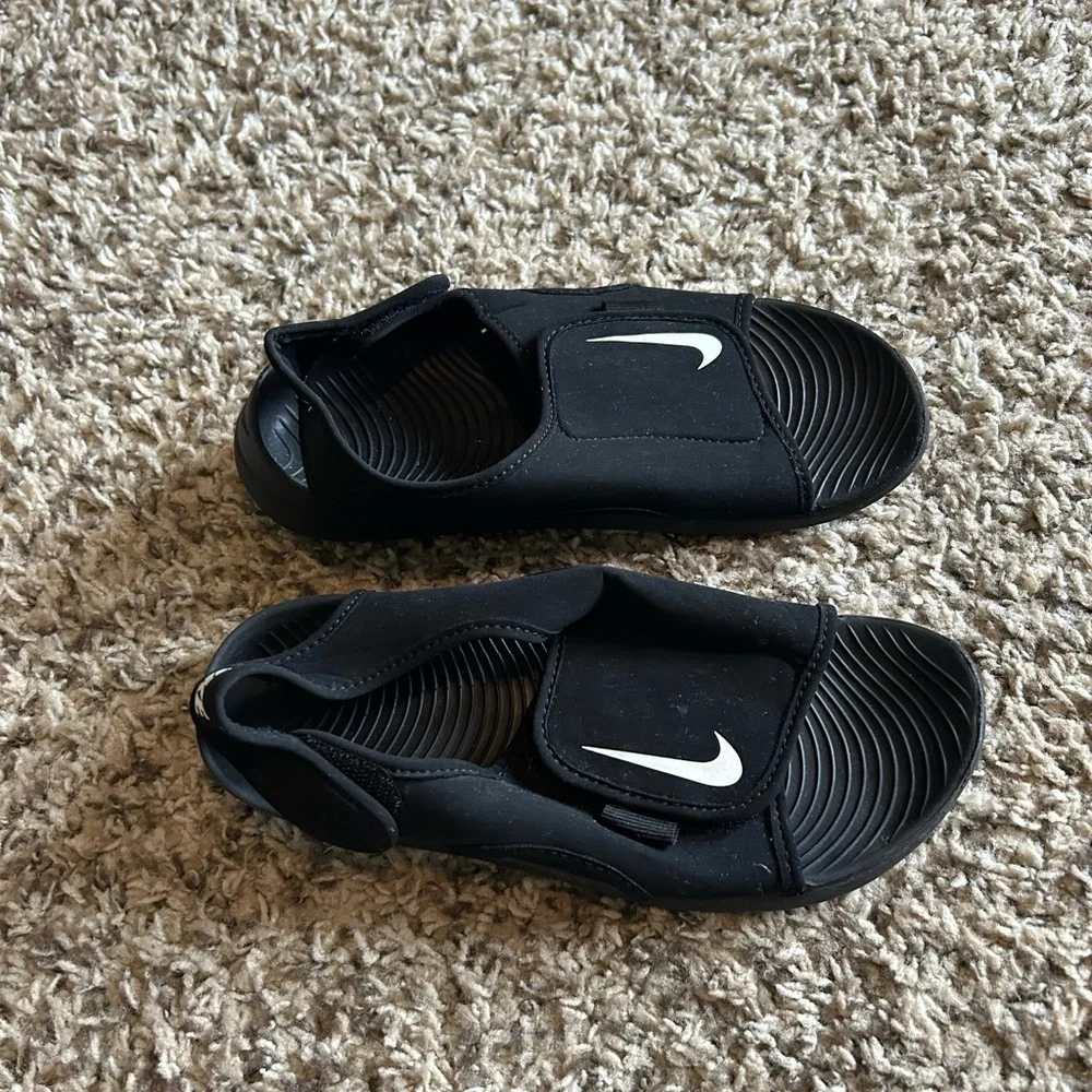 Nike Kids Black Slide Sandals with White Swoosh Accent